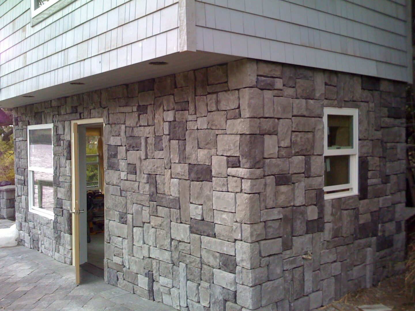 A building with stone walls and a door.